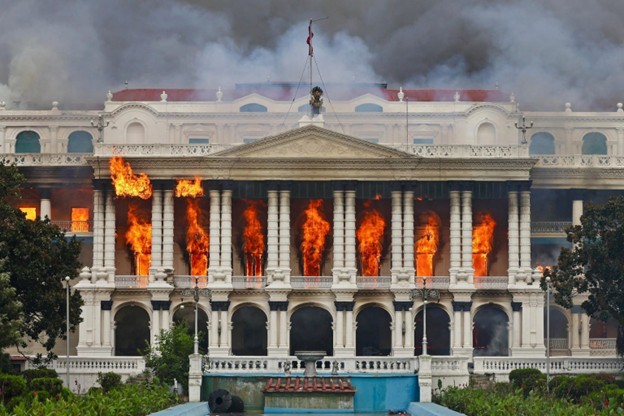 Nepal's central administrative complex, Singha Durbar, burning after protesters set multiple government buildings ablaze during the country's September 2025 unrest, Kathmandu.